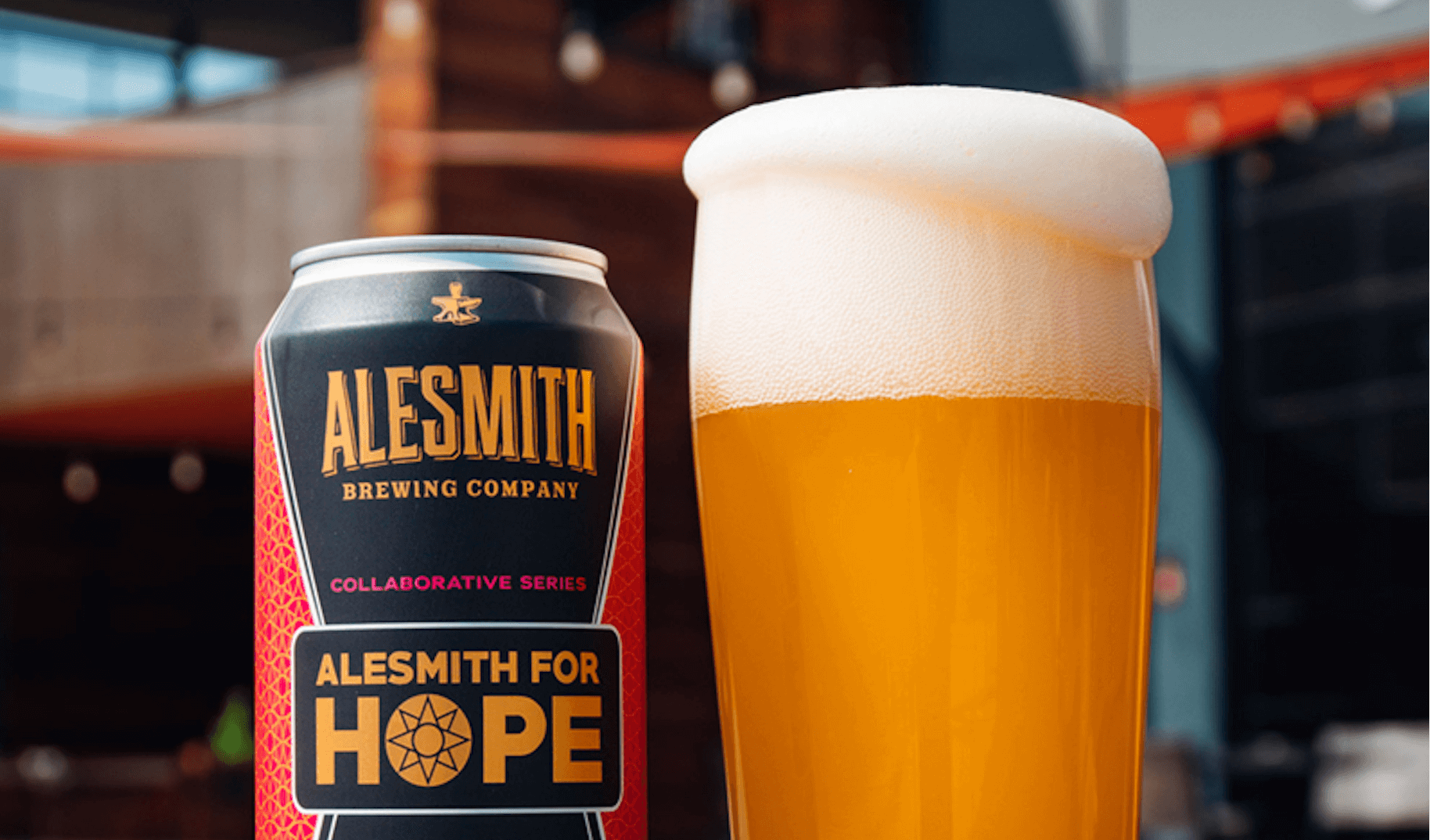Alesmith Brewing Company can with large glass of beer foaming